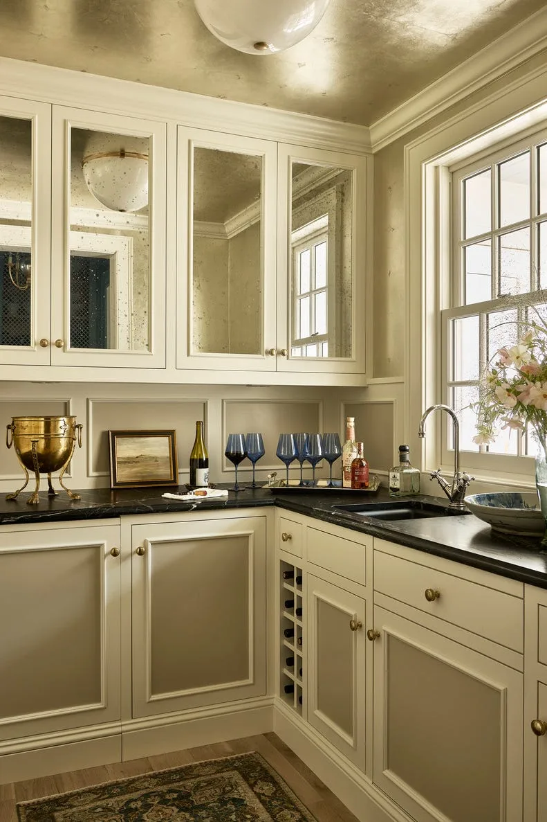 Butler's pantry in Minneapolis home with open shelving and marble