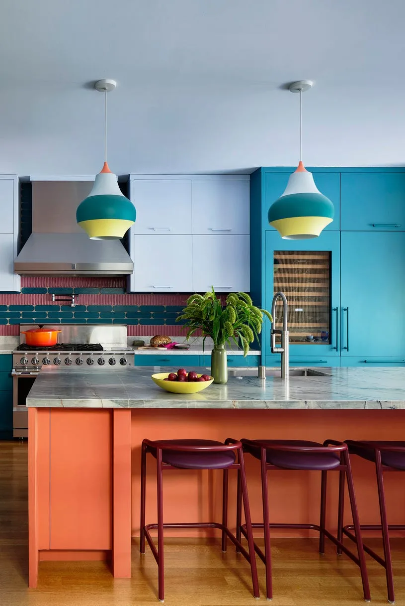 Kitchen in a 1915 San Francisco home with blue cabinetry and subway tile