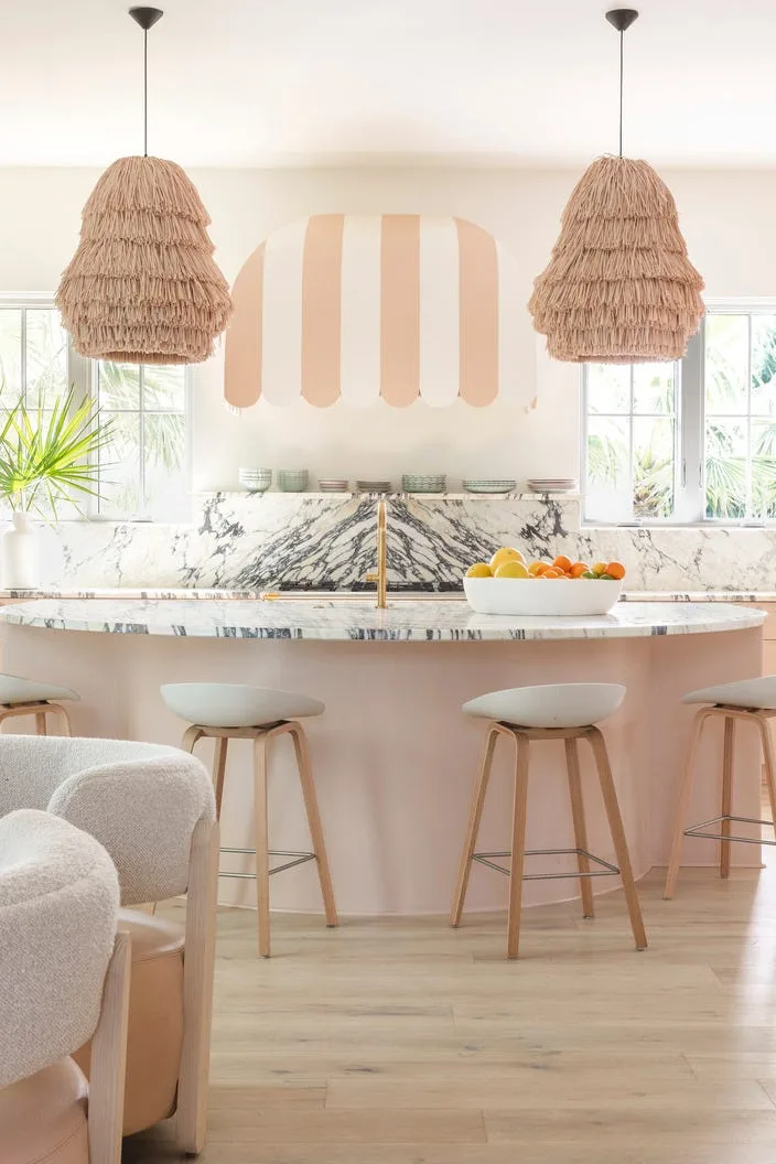 Kitchen in Florida beach house with white shaker cabinets and beadboard