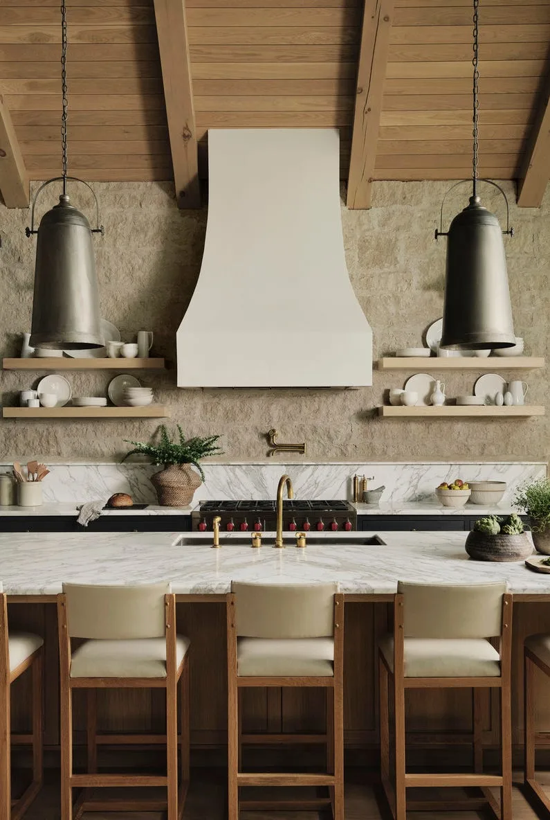 Kitchen in Kawartha Lake retreat with wood beams and lake view